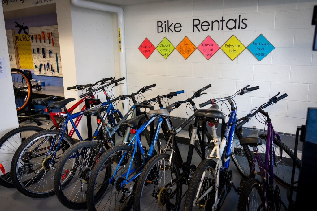 HMC Bike Hub. A row of bikes are ready for rental.