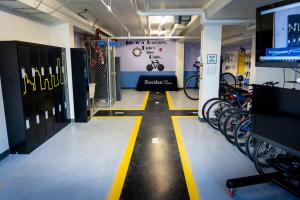 HMC Bike Hub - Indoors. Bikes, lockers, TV's and a bike themed room. 